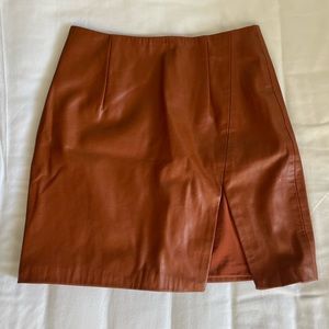 Brown/orange leather mini skirt with slit